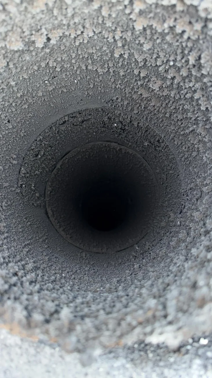 Creosote buildup inside a chimney flue